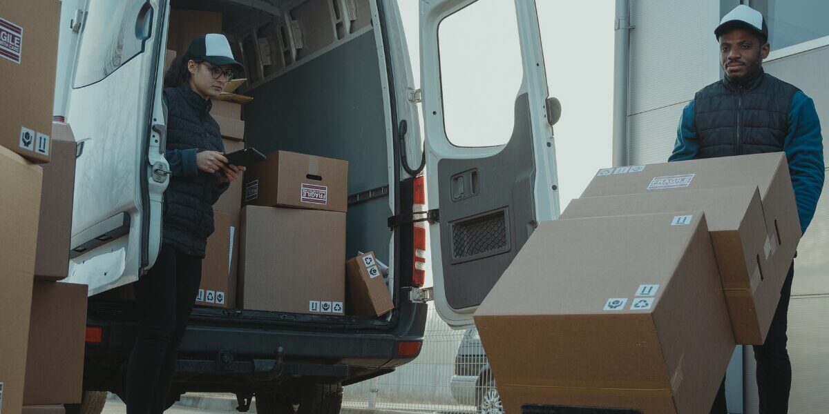 Appliance delivery getting unloaded from van Appliance delivery getting unloaded from a van